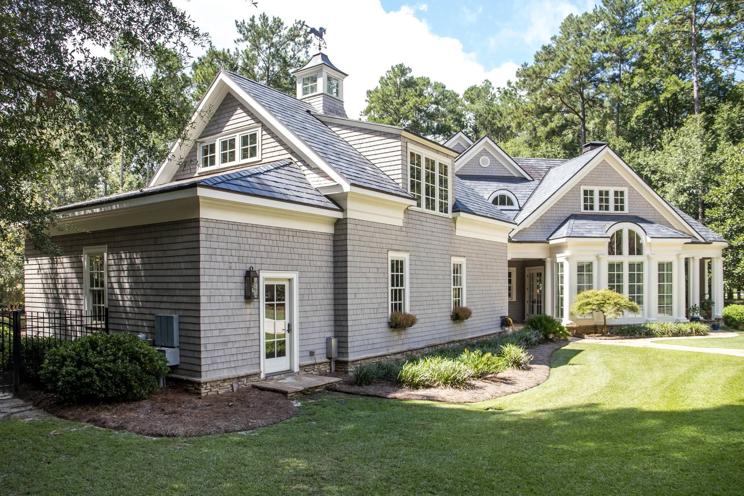 The outside of a Maine home after being painted by Innovation Painting & Remodeling.